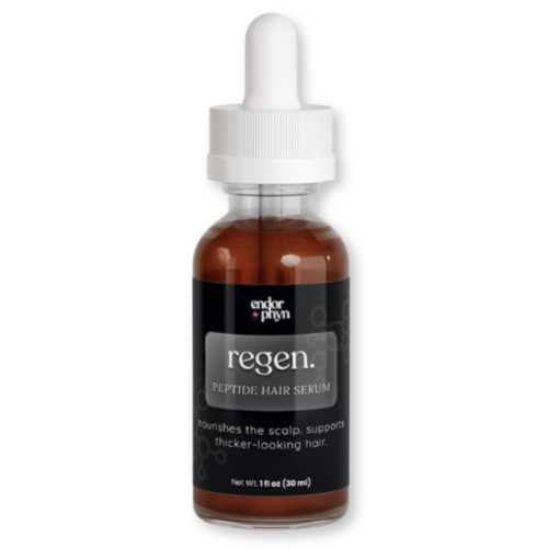 Bottle of regen hair serum with dropper on a white background